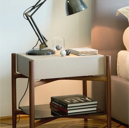 Regent nightstand in wood covered with leather by Porada