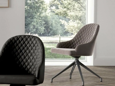 Gilda swivel chair by Ozzio.