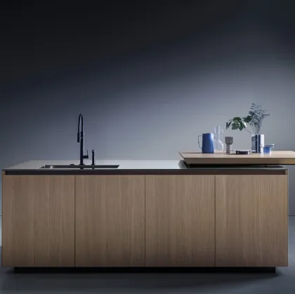 Euromobil's Antis Project 10 Design Kitchen with a natural sandblasted oak island and stainless steel countertop.