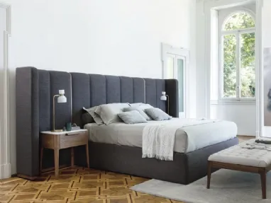 Aida bed with headboard by Porada.