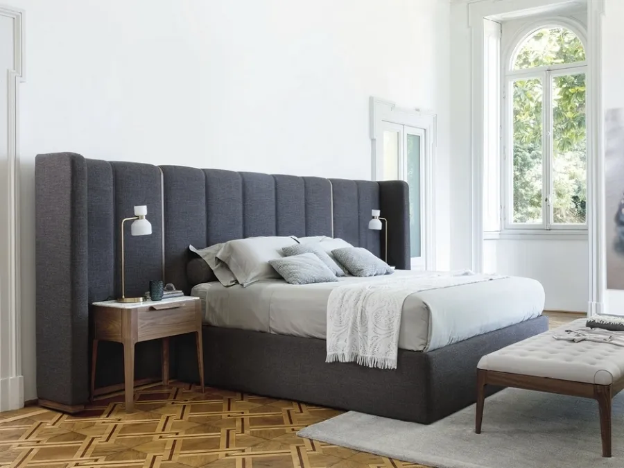 Aida bed with headboard by Porada.