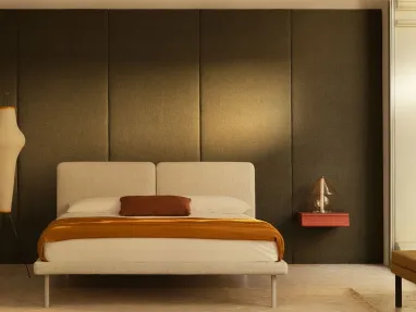 Cloth bed with Face headboard by Bolzan Letti.