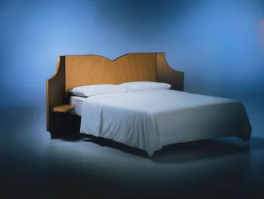 Fiocco bed with wooden headboard by Bolzan Letti