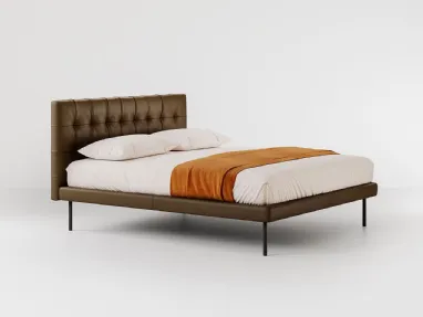 Leather bed with quilted headboard Metropolitan Deluxe by Bolzan Letti.
