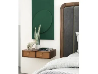 Bayus suspended bedside table in wood with leather drawers by Porada.