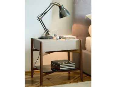 Regent nightstand in wood covered with leather by Porada