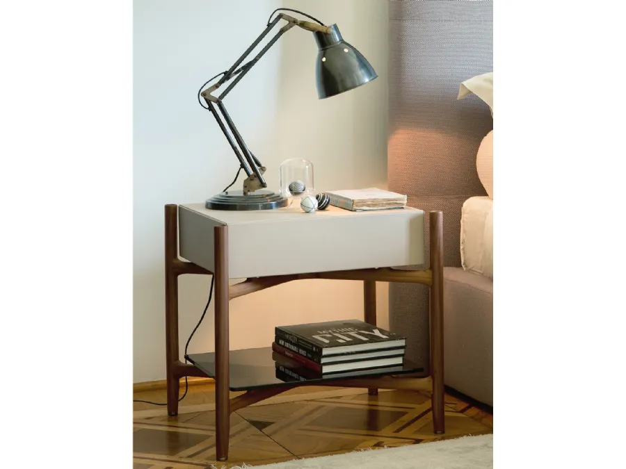 Regent nightstand in wood covered with leather by Porada