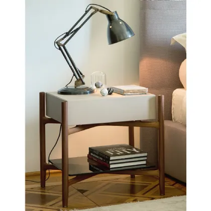 Regent nightstand in wood covered with leather by Porada