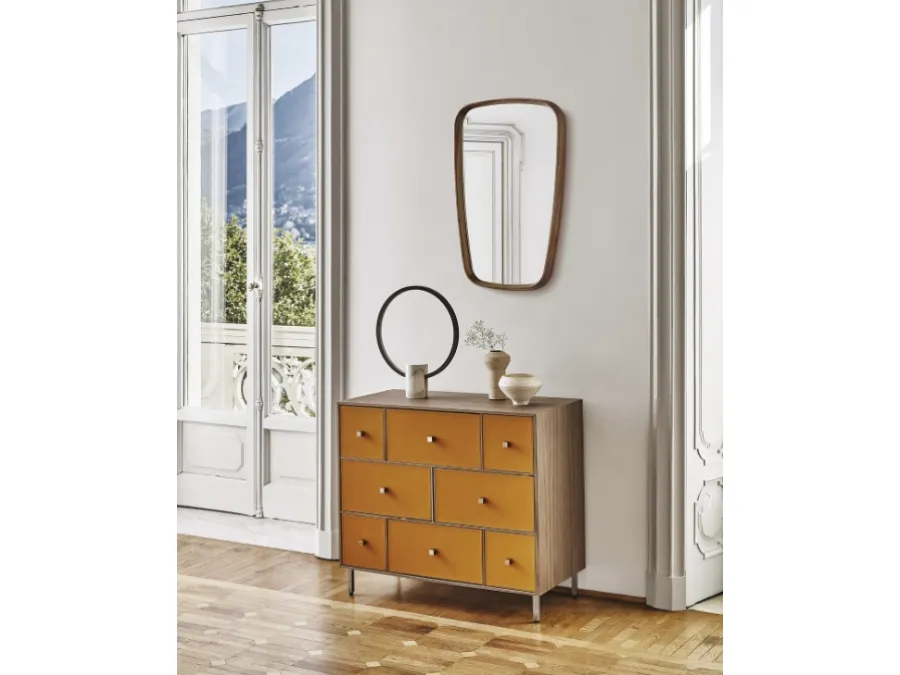 Rucellai wooden chest of drawers with drawers covered in Porada leather.