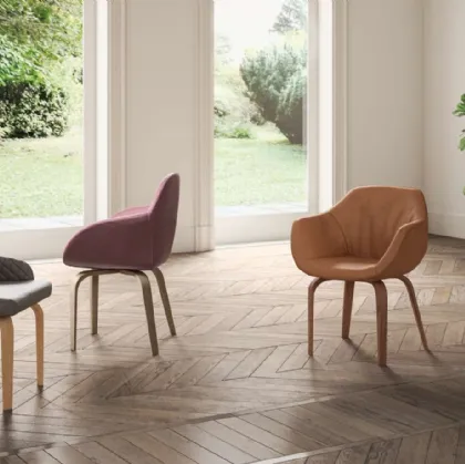 Athena leather chair with Ozzio wooden legs.