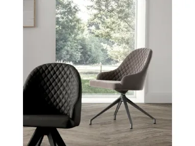 Gilda swivel chair by Ozzio.