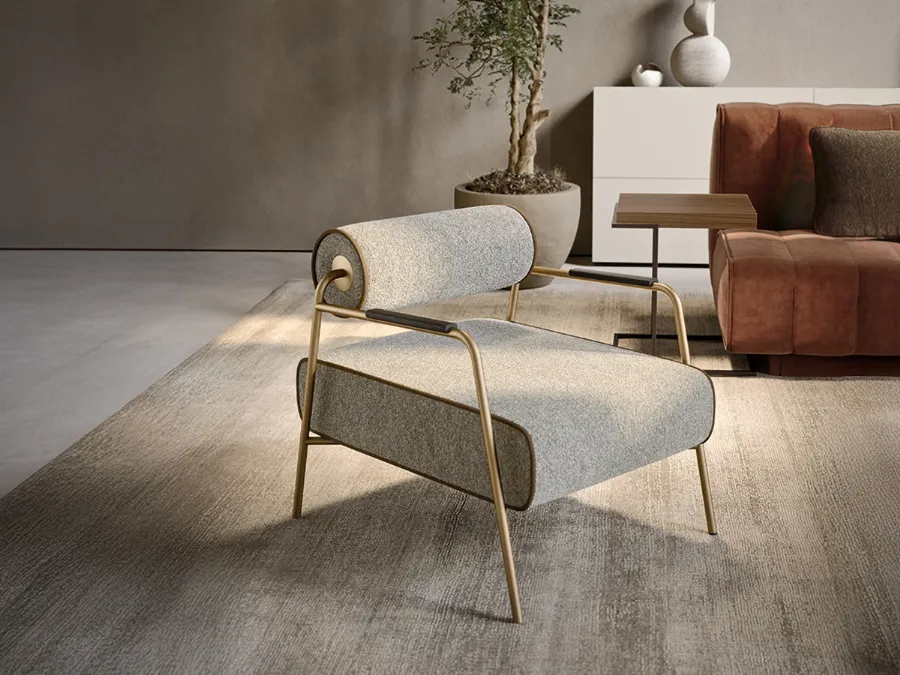 Levante upholstered armchair in fabric by Pianca.