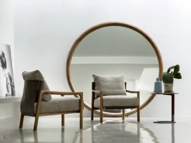 Vera armchair in fabric, leather, and Porada wood.