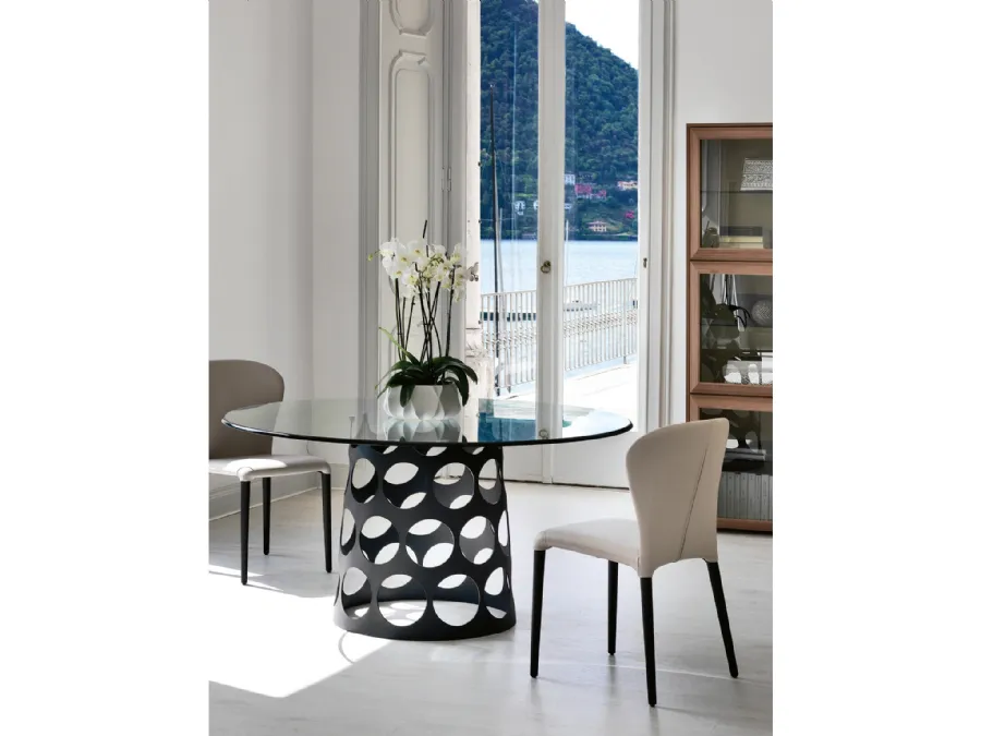 Table Jean with a glass top by Porada.