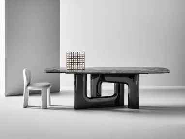 Liaison designer table with a marble top and polyurethane base by Bonaldo