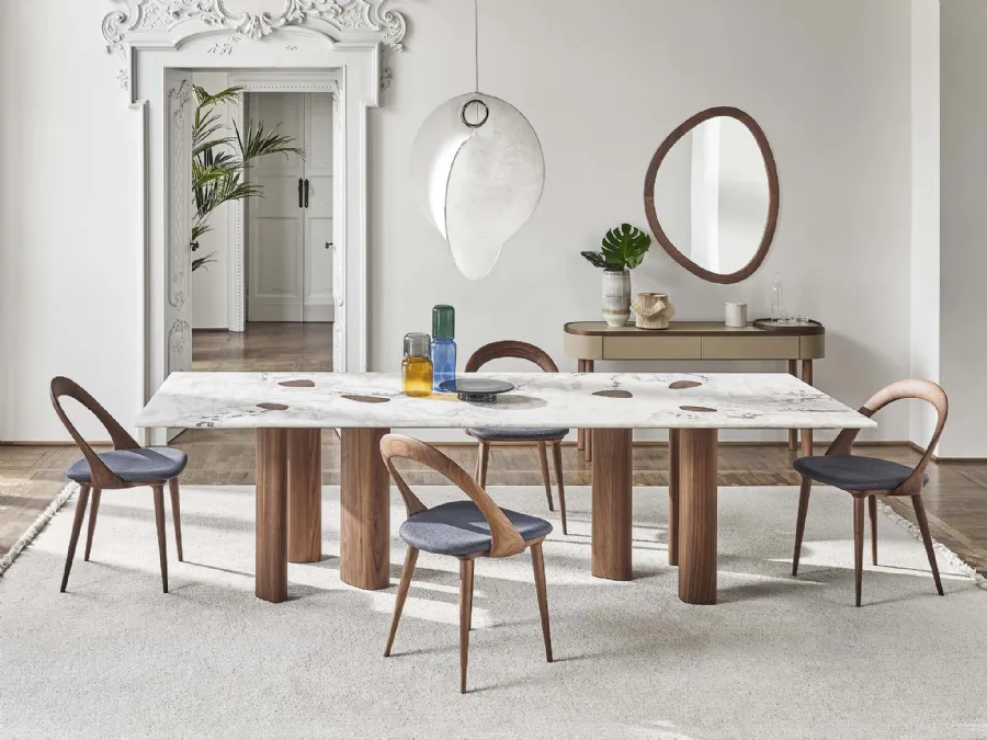 Oswood table with a marble top and Porada wood base.