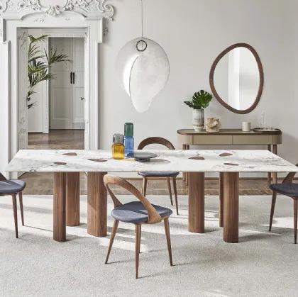 Oswood table with a marble top and Porada wood base.